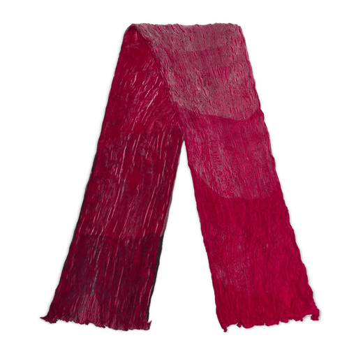 A bright pink pleated scarf.
